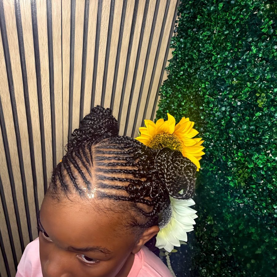 Braided hairstyle at Ecco Crown Braiding Studio